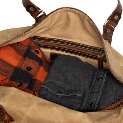 Sac de voyage Drakensberg modèle Cody, toile cirée et cuir de buffle tanndé végétal 50 L — bleu océan, kaki sable, vert forêt