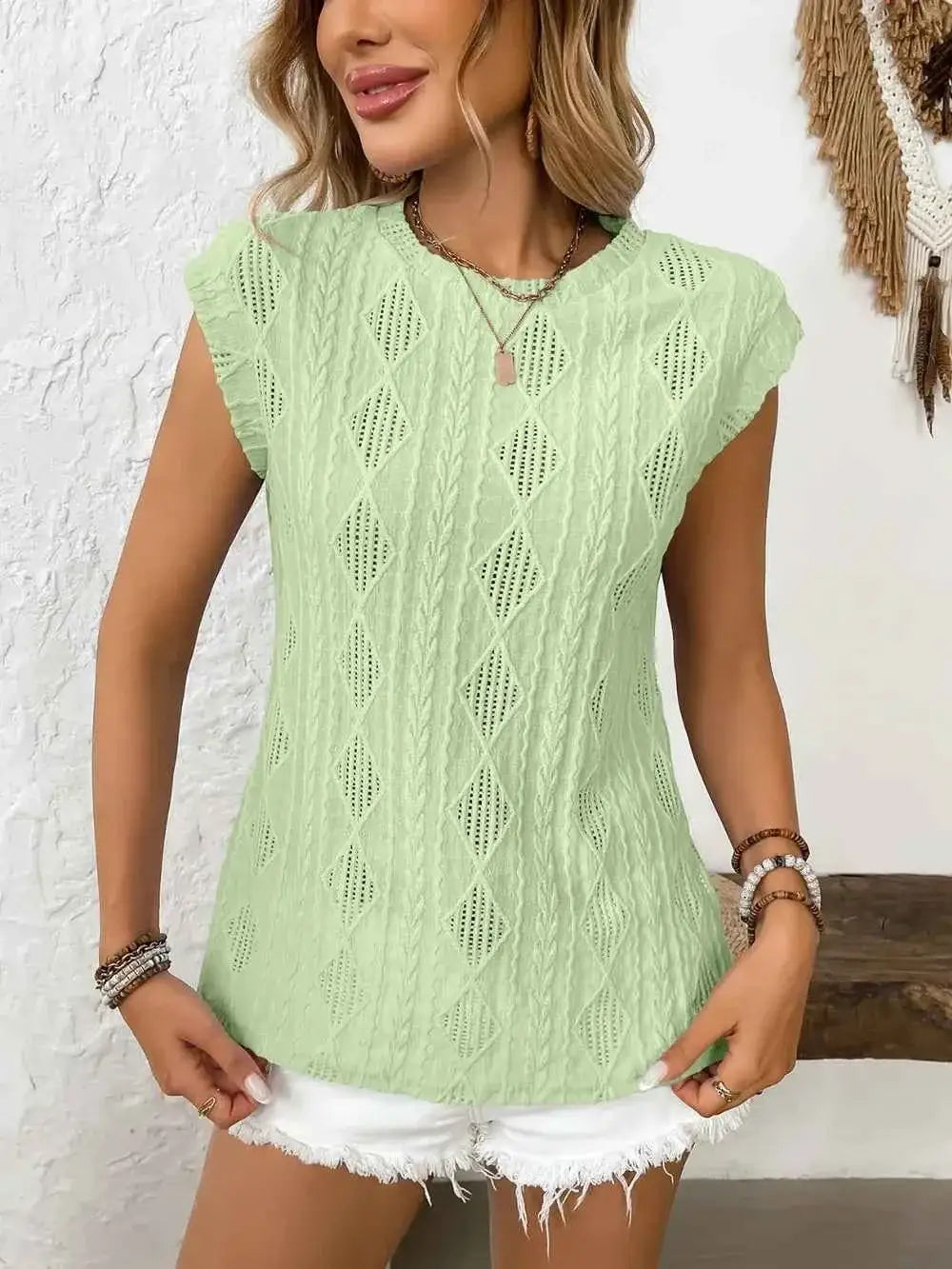 Top à oeillets col rond manches courtes