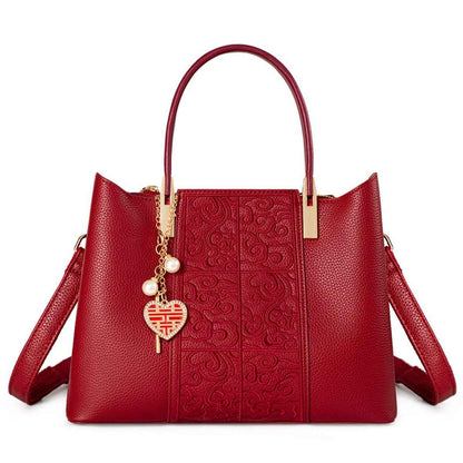 Sac à main gauffré à poignée en cuir rouge