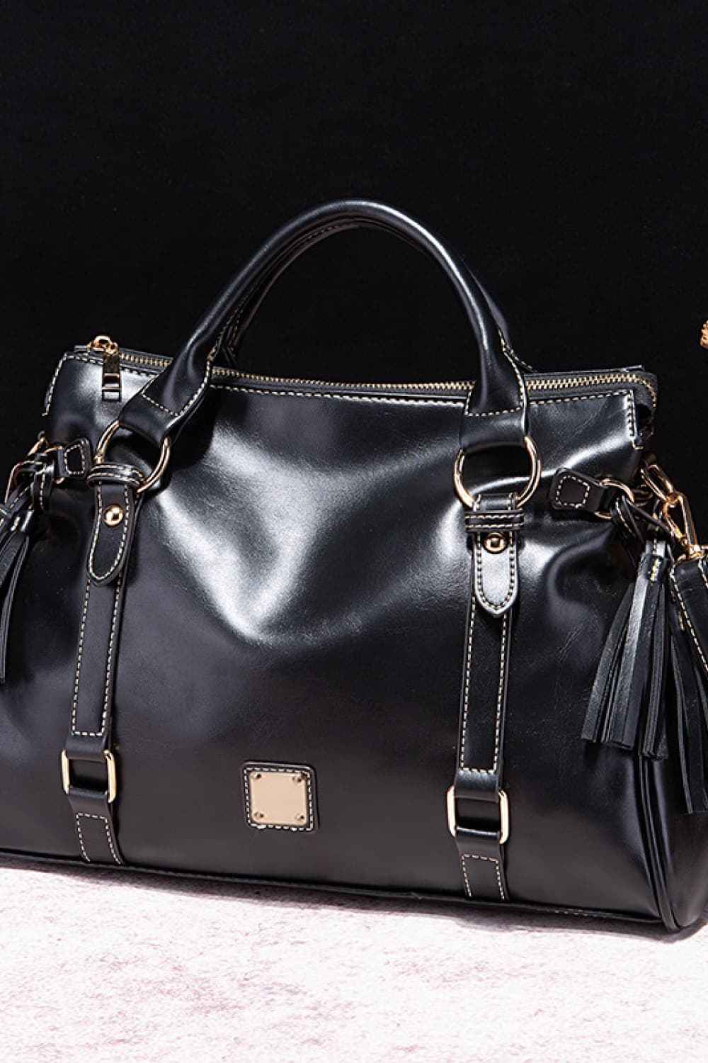 Sac à main en cuir à pompons