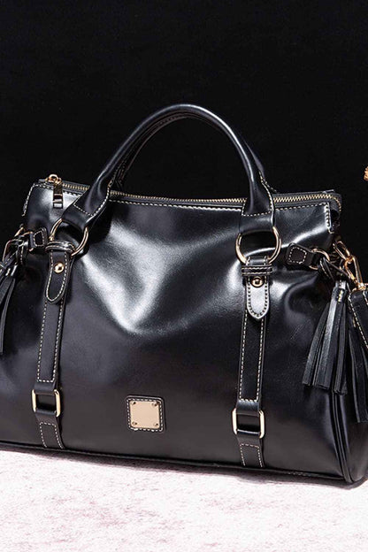 Sac à main en cuir à pompons