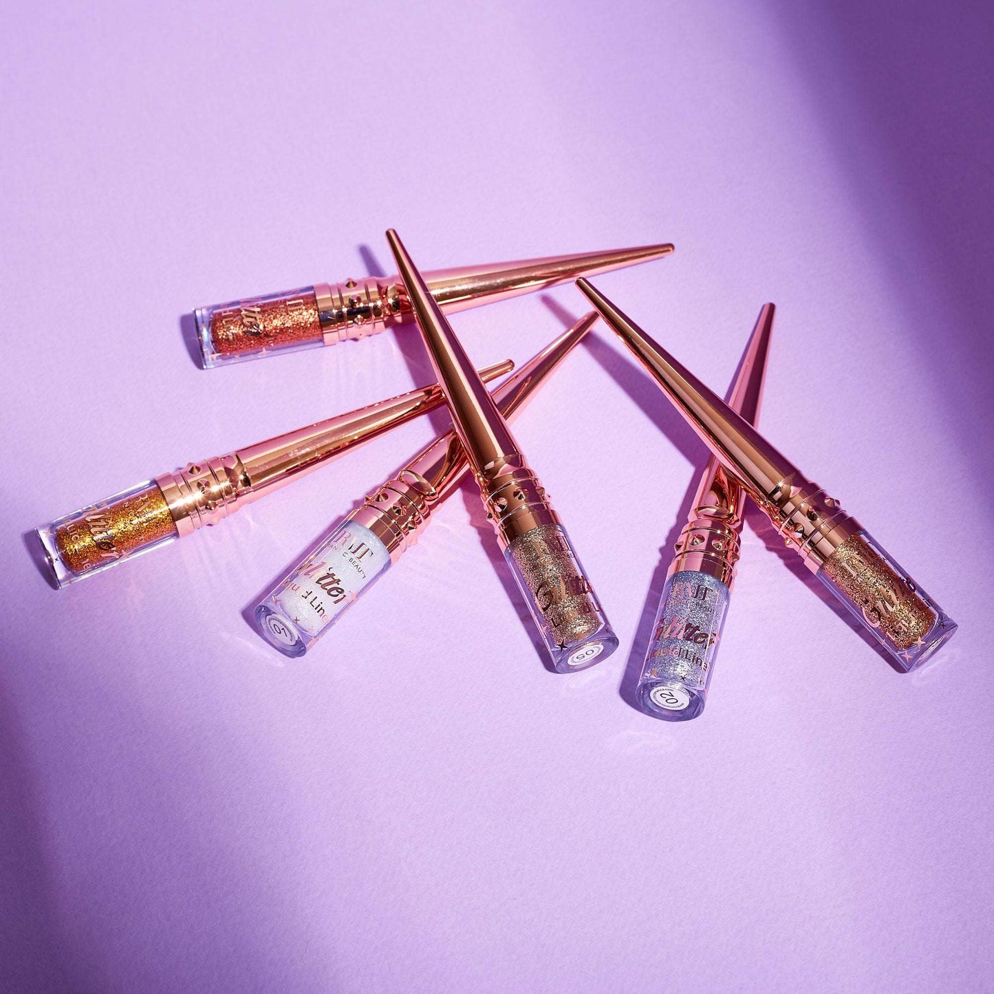 Eyeliner liquide pailletté tons dorés