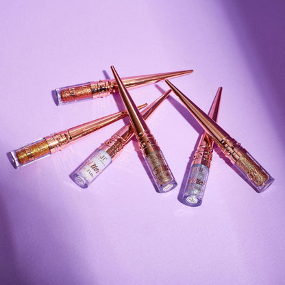 Eyeliner liquide pailletté tons dorés