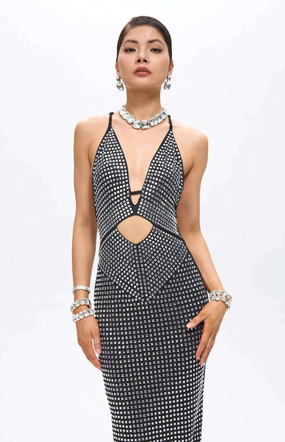 Robe longue noire découpée ornée de cristaux