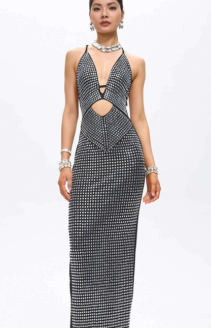 Robe longue noire découpée ornée de cristaux