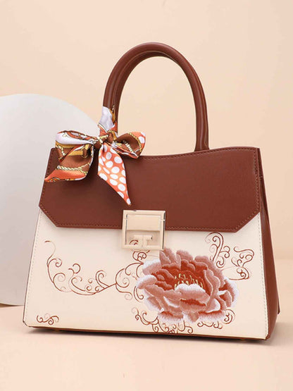 Sac à main en cuir de vachette à ornement floral
