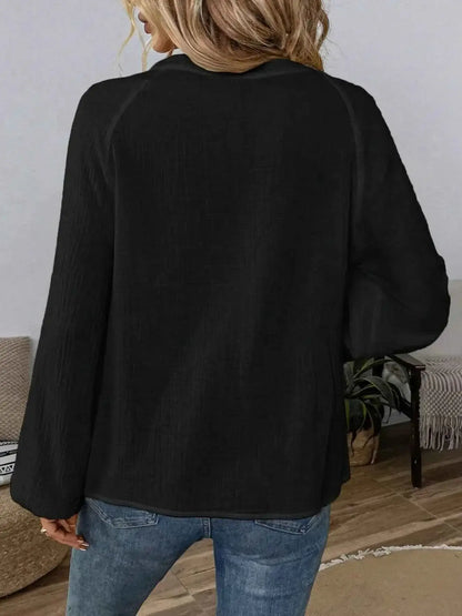 Blouse à motif paisley col cranté manches longues