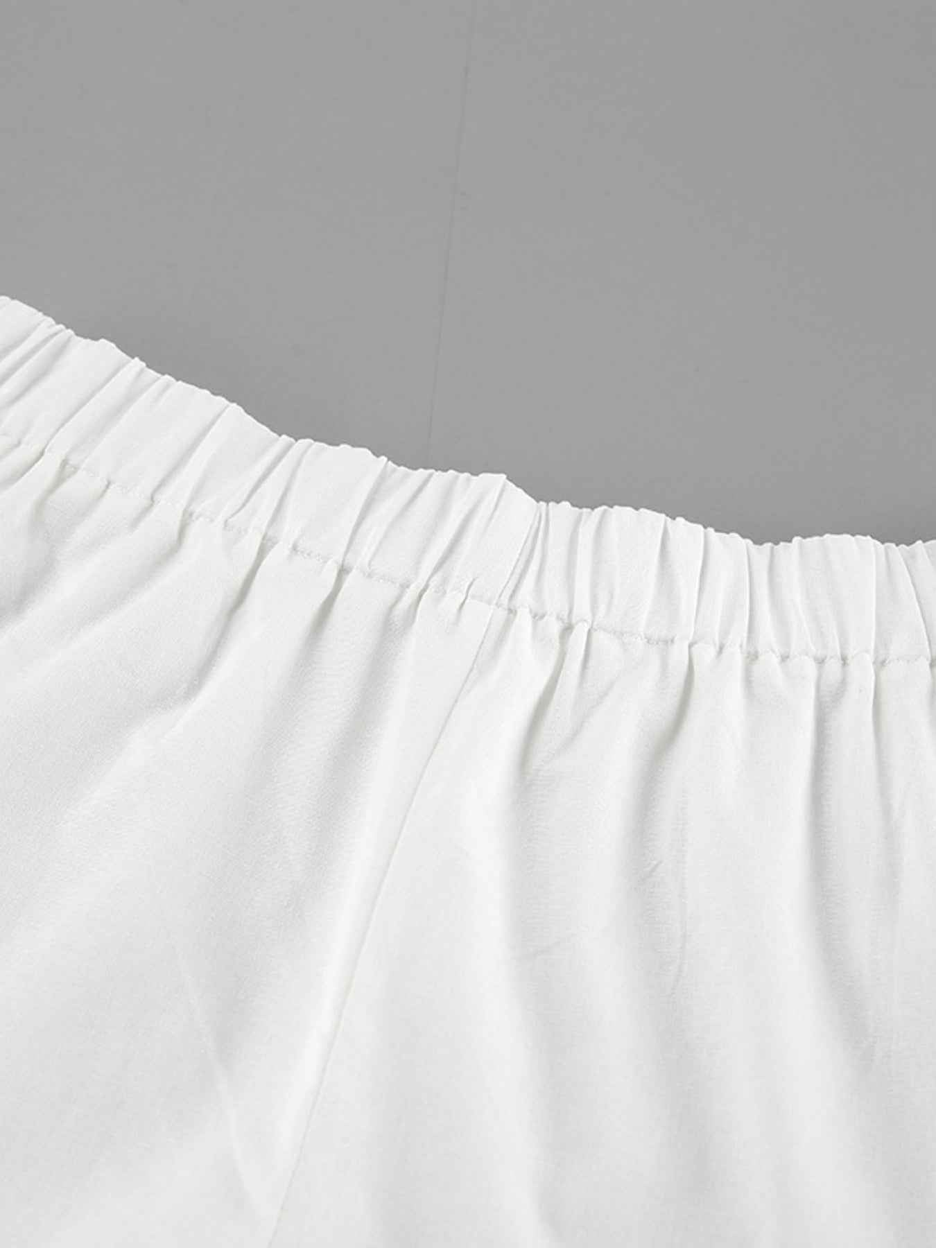 Ensemble deux pièces blouse à col noué et manches ballon avec short