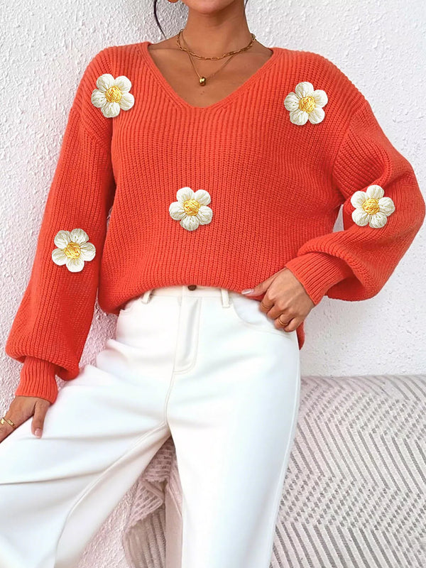Pull col V à côtes et appliqués floraux