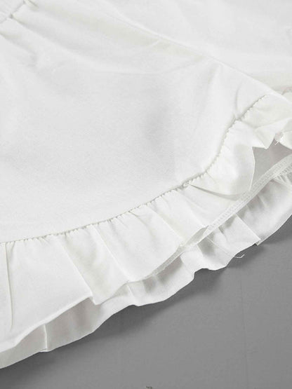 Ensemble deux pièces blouse à col noué et manches ballon avec short