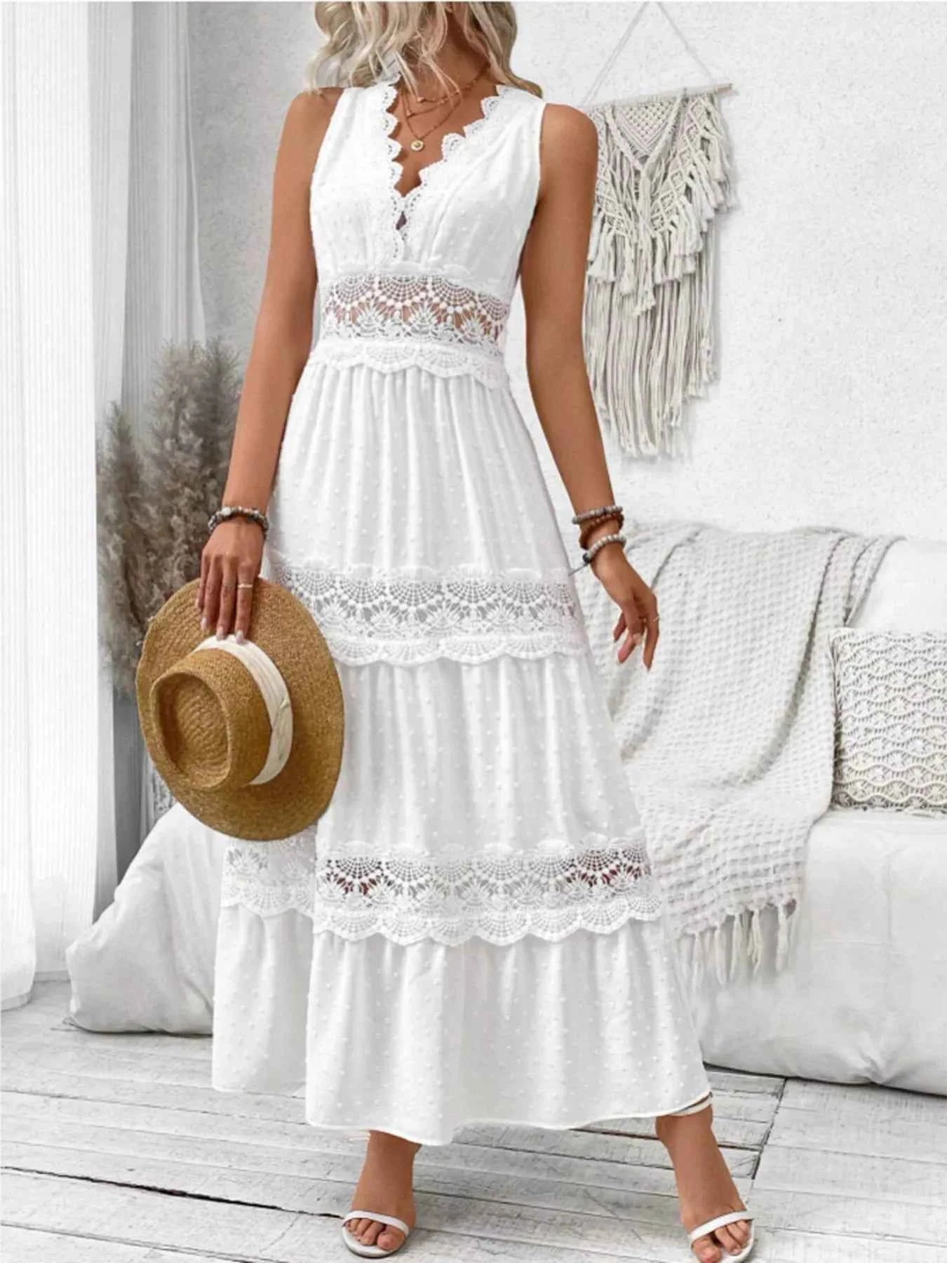 Robe longue sans manches à détails dentelle et dos noué