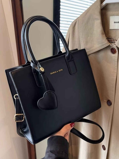 Sac bandoulière à poignée supérieure en cuir