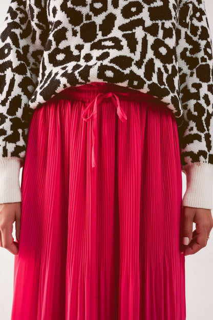 Jupe midi plissée en mousseline fuchsia