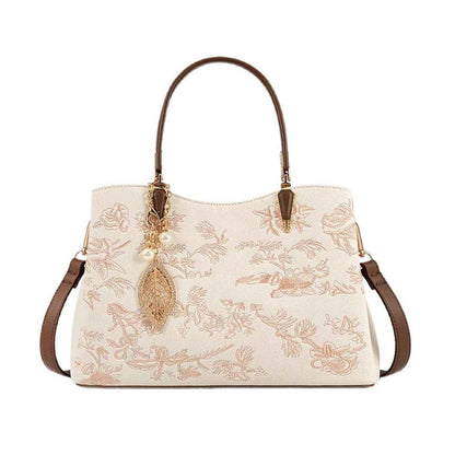 Sac à main brodé fleuri en cuir