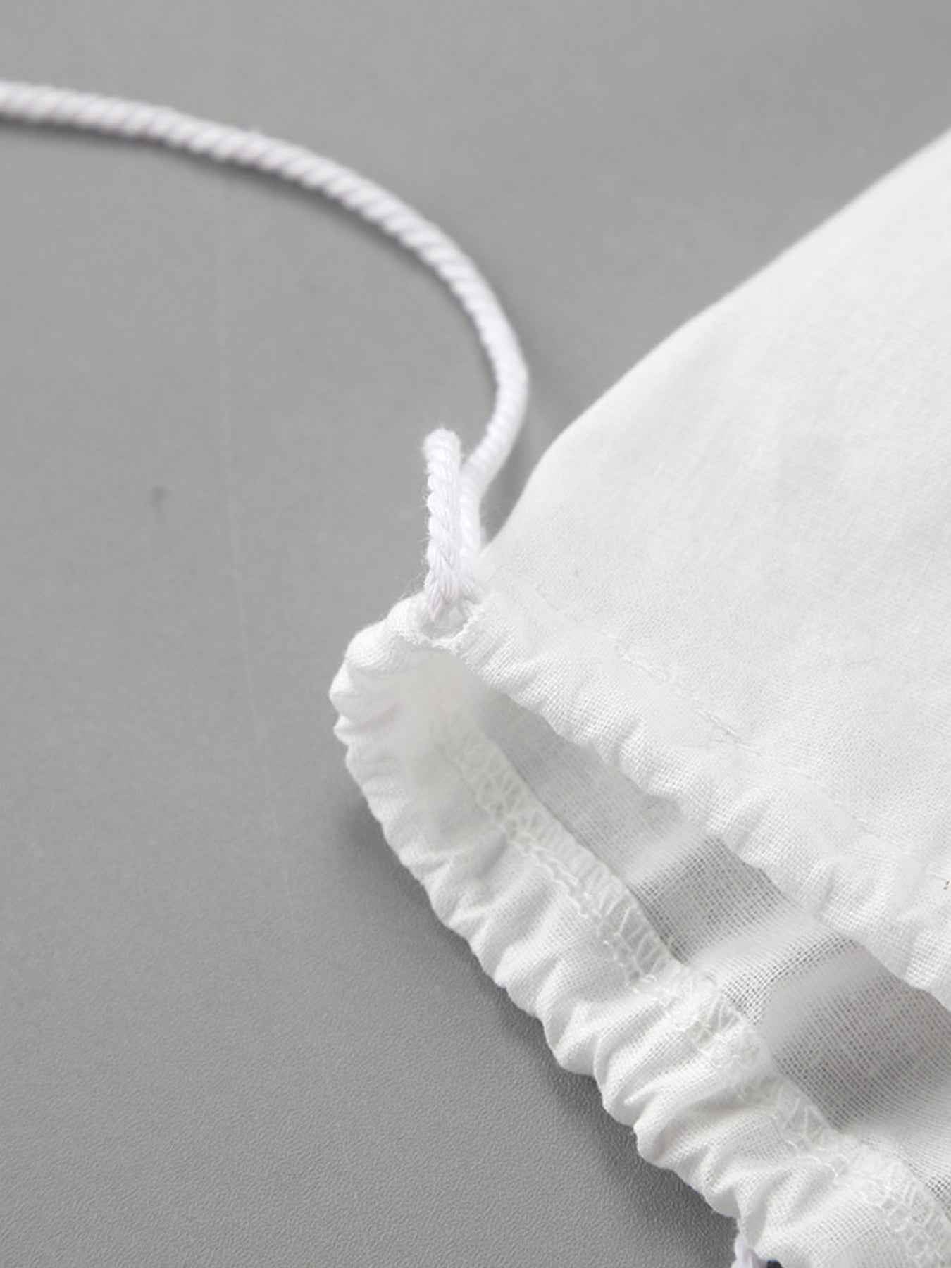 Ensemble deux pièces blouse à col noué et manches ballon avec short