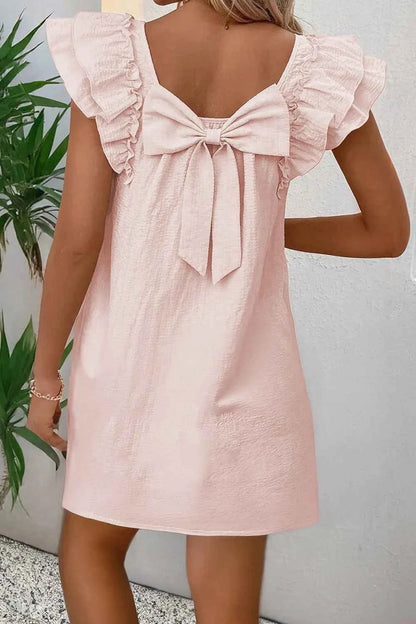 Mini-robe à volants et nœud dans le dos