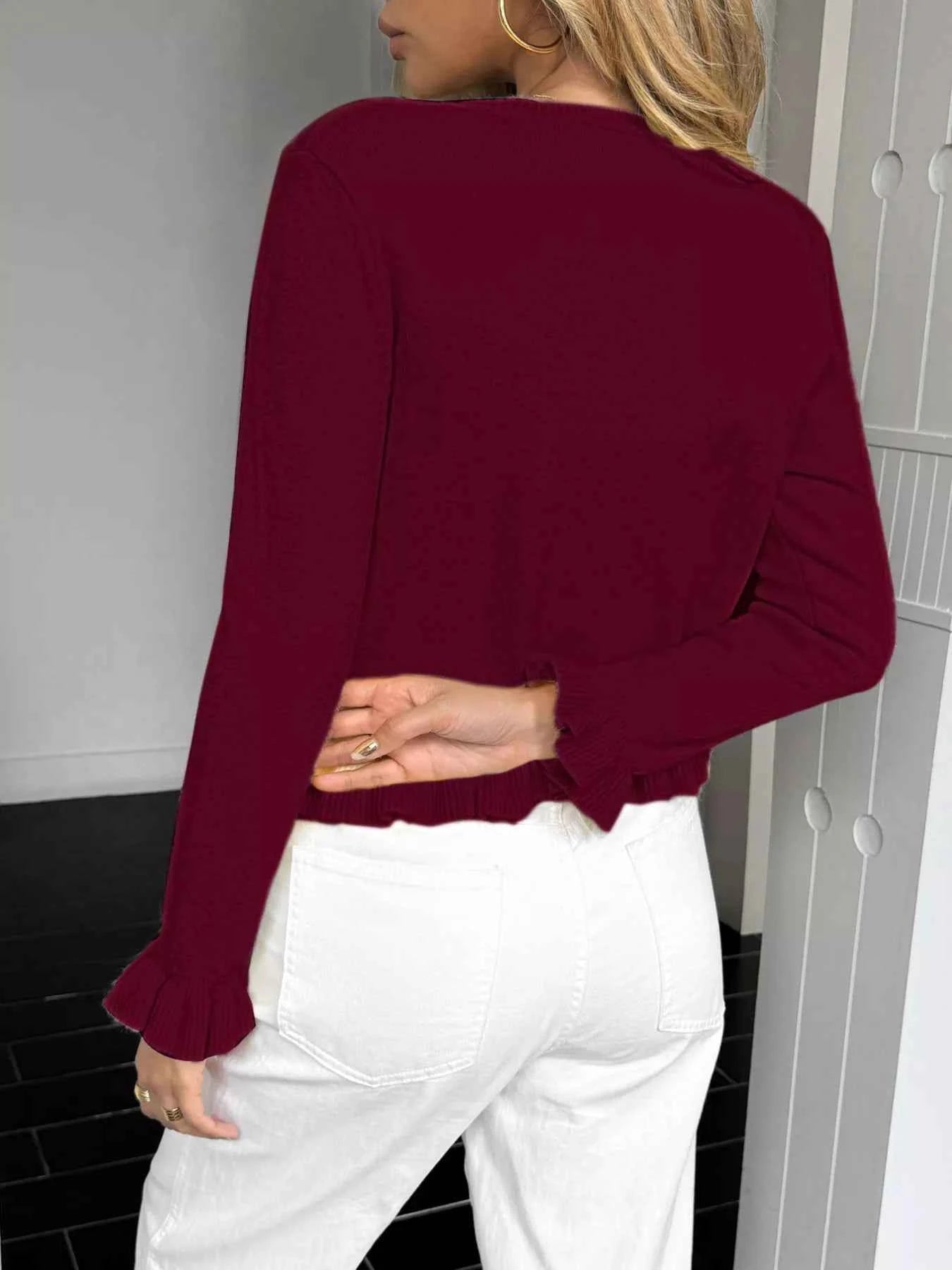 Cardigan en maille boutonné à volants