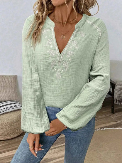 Blouse à motif paisley col cranté manches longues