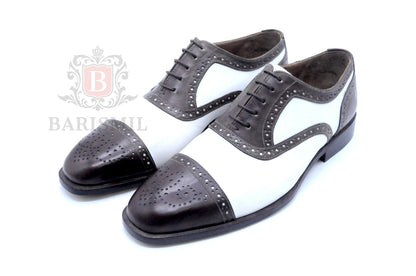 Oxford spectator bicolore brogues — construction Goodyear welt, cuir premium