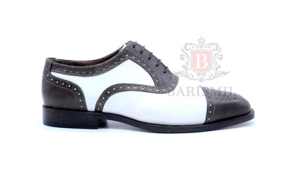 Oxford spectator bicolore brogues — construction Goodyear welt, cuir premium