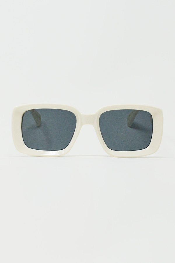 Oversize rectangular sunglasses with a wide white frame